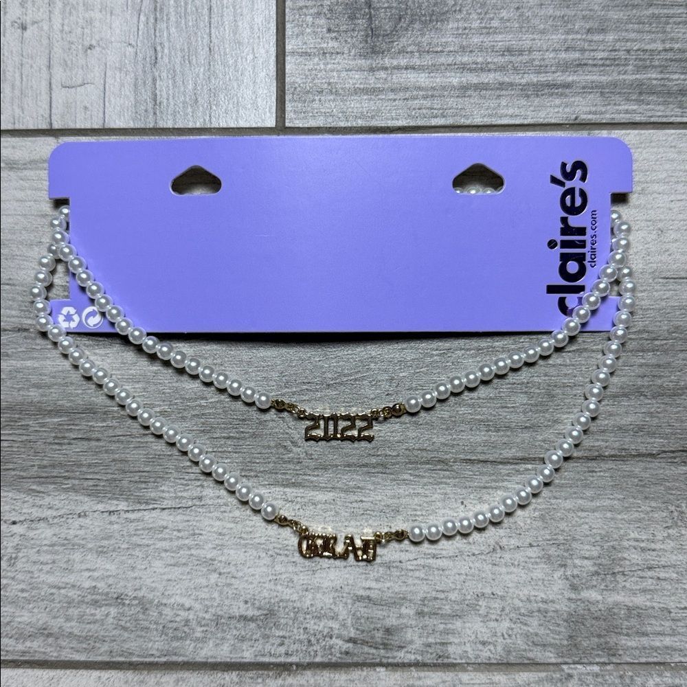 Claire’s “2022 Grad” pearl choker necklace duo